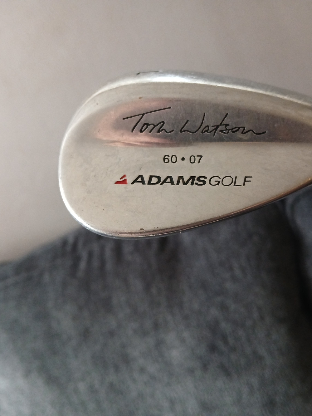 A right-handed Adams Tom Watson 60-07 Lob Wedge featuring a 60-degree loft and 7